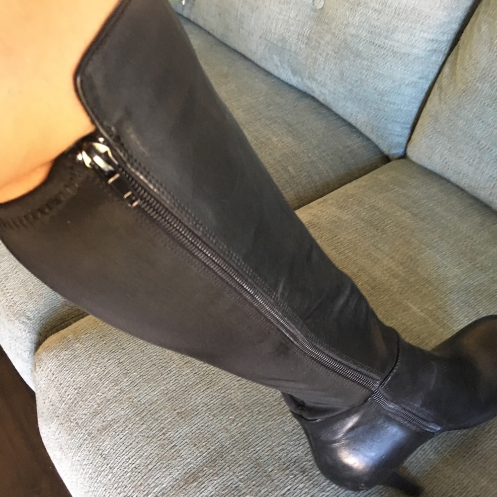 Knee high black leather boots